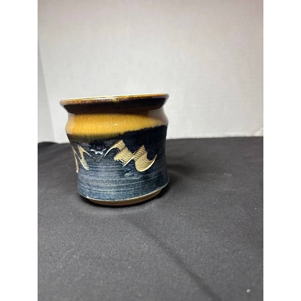Pottery in Browns and‎ Blue